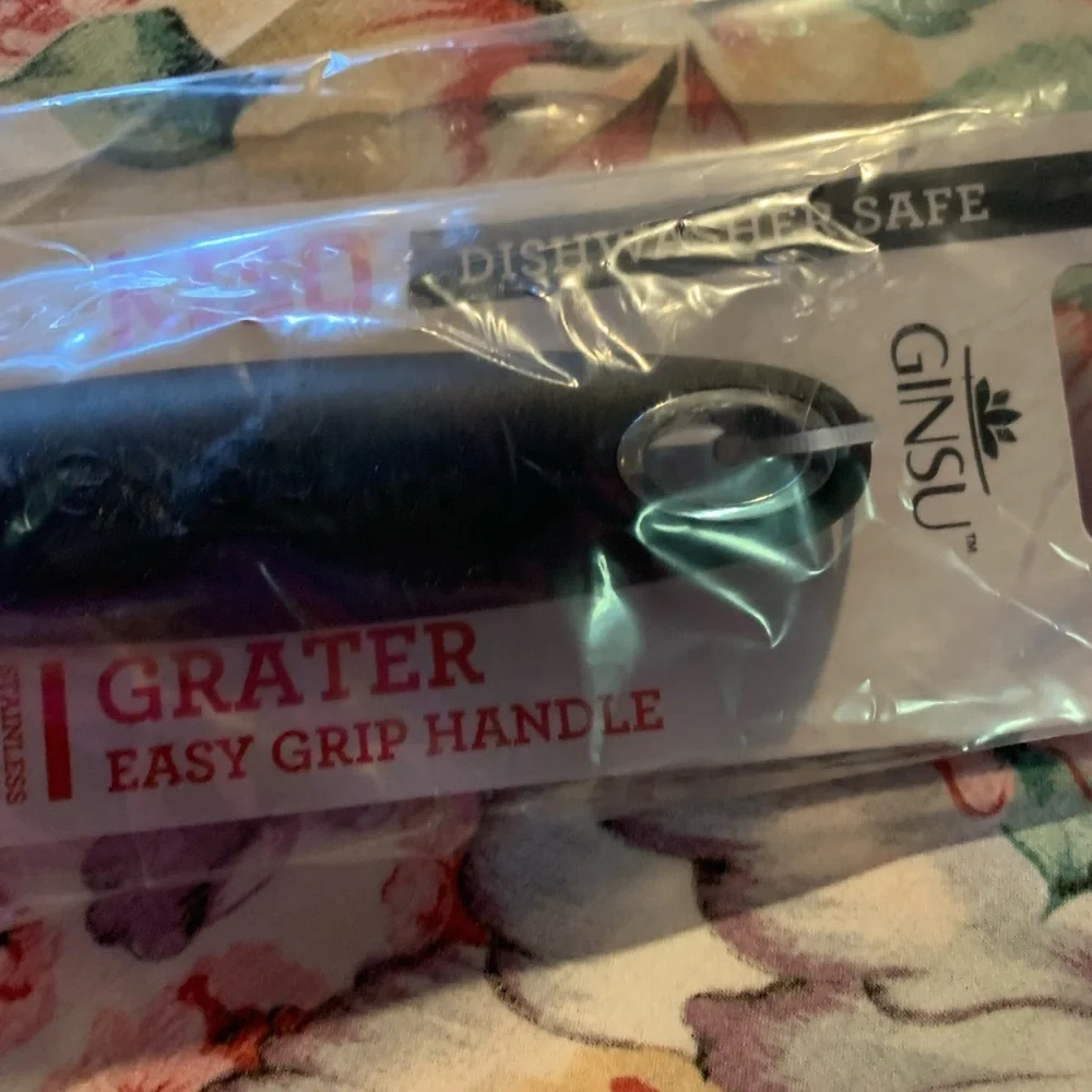 Silver Stainless Steel Cheese Grater with Black Ergonomic Handle
